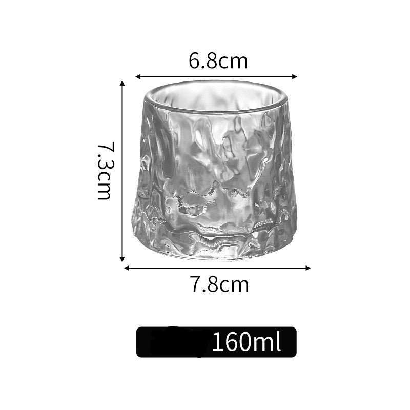 Rotating tumbler whiskey glass