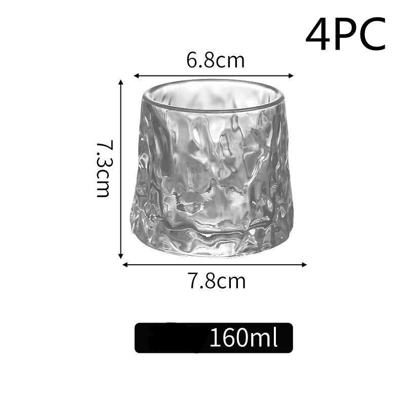 Rotating tumbler whiskey glass